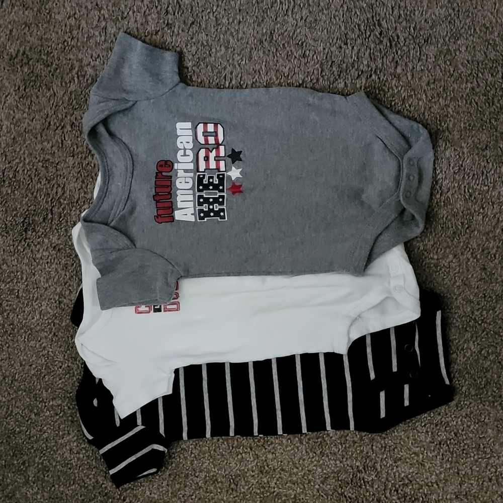 Carters bodysuit size 6 months and 6-9 months.